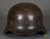 WWII German Army Model 1940 Single Decal Helmet with Battle Damage