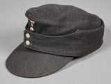 Extremely Early Army Panzer Officer Wrapper with Trousers and M-43 Panzer Cap